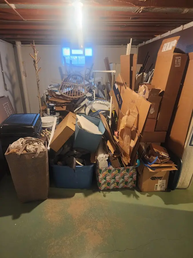 Roll-off dumpster container at job site for 8 Yard Dumpster Rental in Southport